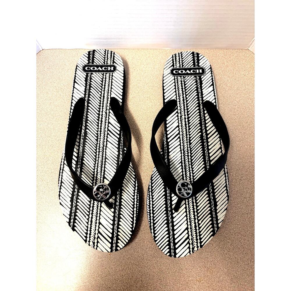 Coach Alessa flip flops in black and white with silver medallion hardware 11-12